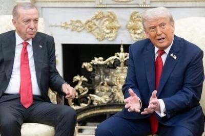 US President Donald Trump speaks to the press a he meets meets with Turkey's President Recep Tayyip Erdogan in the Oval Office of the White House in Washington, DC, on September 25, 2025.