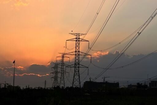 Electricity pylons at sunset in Tehran