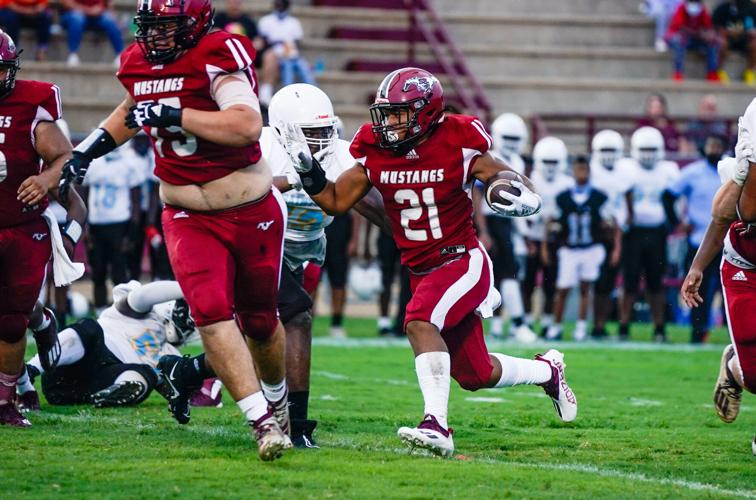 PHOTOS: Rain doesn't stop Stanhope Elmore's 37-0 shutout of Selma