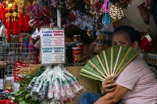A sign at a stall in Manila advertises "pamparegla", medication believed to help stimulate menstruation. More than 250 women are hospitalised every day due to complications from unsafe abortions, according to a PINSAN study, and about three of them die