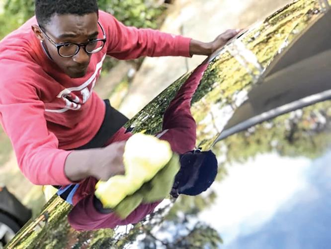 Tolbert’s car detailing business grows exponentially since high school