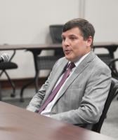 Council agrees to contract with attorney