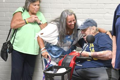 Cliff Williams / TPI Almost everyone hugged on Harlon Davis Saturday at his birthday part. He was even greeted by Wetumpka Mayor Jerry Willis.