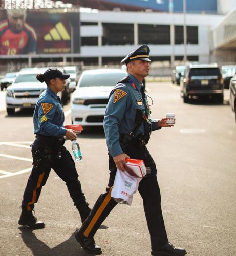 New Jersey State Police with Rapid Relief Team supplies outside of MetLife Stadium.