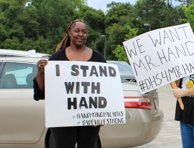 Ogletree speaks before the board regarding Chris Hand