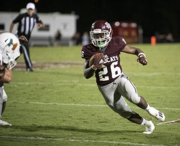 PHOTOS: Ben Russell hosts Huffman in the first game of the season