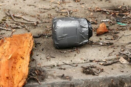 Police said the devices were jars wrapped in tape and containing nuts, bolts and screws -- typical components of IEDs