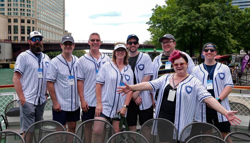 Several attendees and staff members participating in NorthShore's Day Out enjoy the Chicago Architecture Center's First Lady river cruise through downtown Chicago.