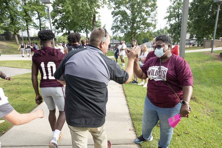 PHOTOS: Ben Russell hosts Huffman in the first game of the season