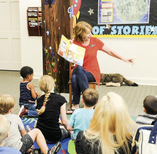 PHOTOS: Donation to library