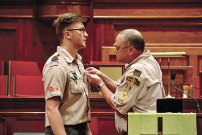 Burgess gets Eagle Scout pin