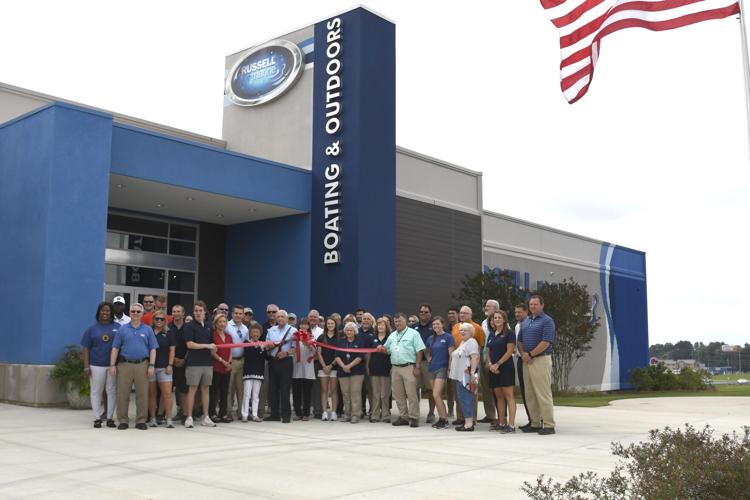PHOTOS: Russell Marine cuts ribbon on outdoor center