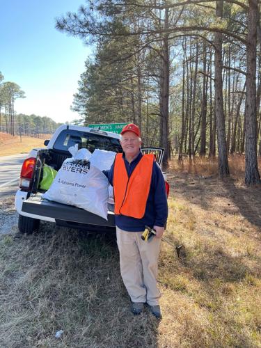 Former CEO participates in lake cleanup after retirement