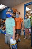 PHOTOS: students PAWS virtual learning for an hour to deliver supplies to humane society