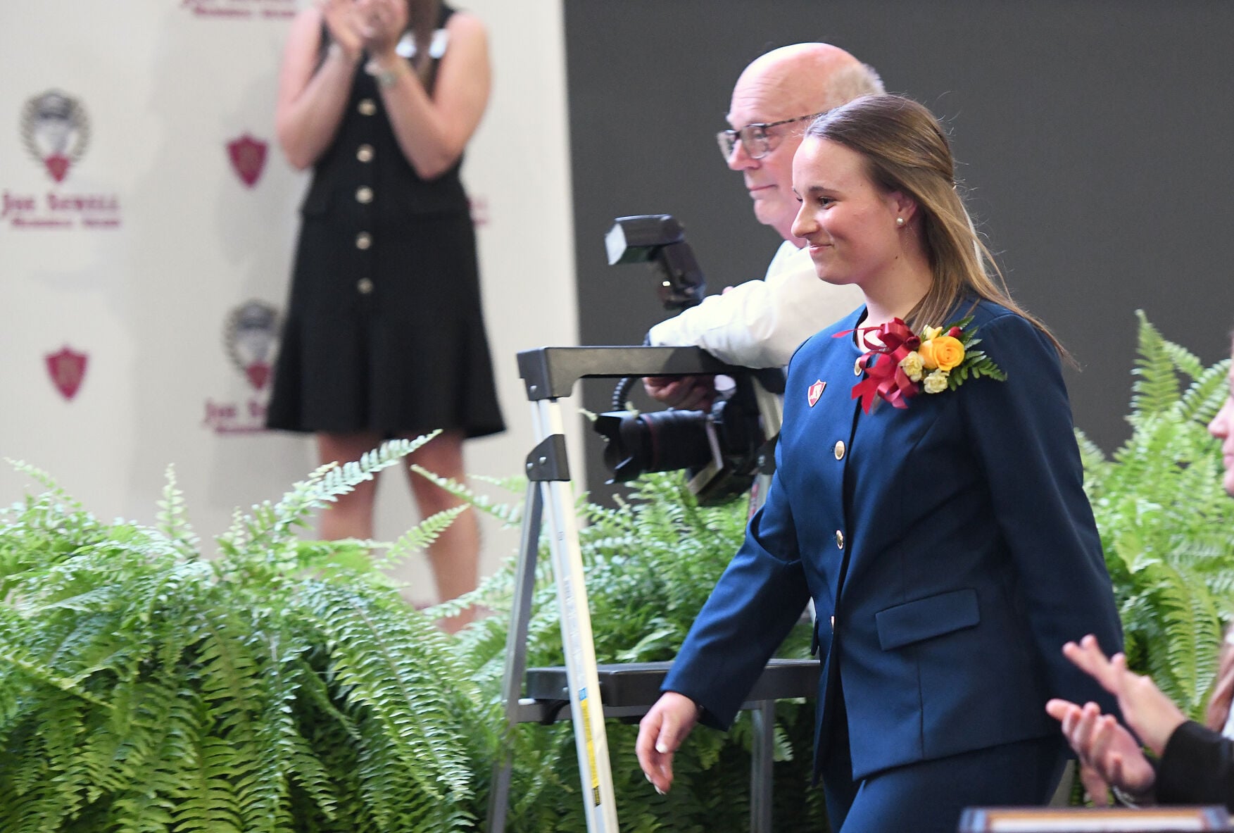 Cliff Williams / TPI Wetumpka High School senior Ashlynn Grace Turner walks to the podium after being named the 2026 Joe Sewell Memorial Award girls overall winner.