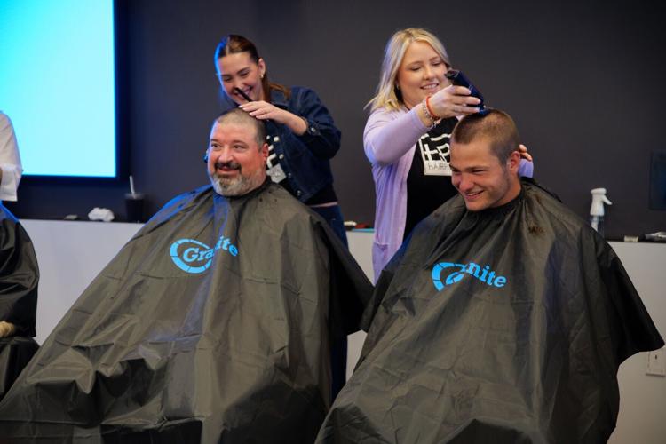 Drake Maye (right), quarterback of the New England Patriots, and Joe Andruzzi (left), a former Patriots player, attend Granite’s 13th annual “Saving by Shaving” event.