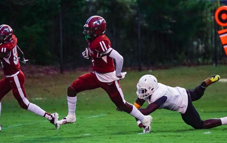 PHOTOS: Rain doesn't stop Stanhope Elmore's 37-0 shutout of Selma