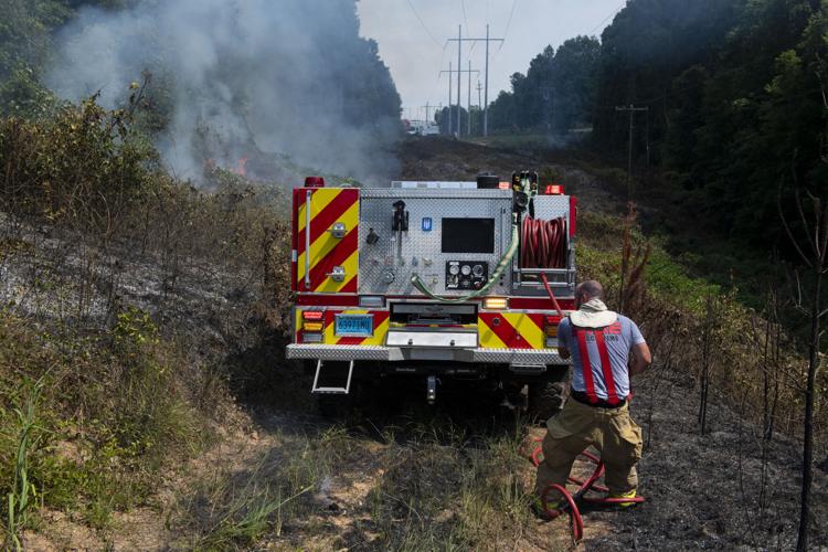 PHOTOS: Brush fire between Riverchase Drive and Sturdivant Road