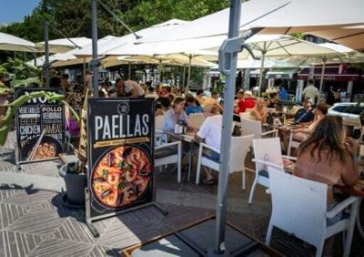 A busy restaurant terrace in Palma Beach, in Palma de Mallorca, on July 18, 2025