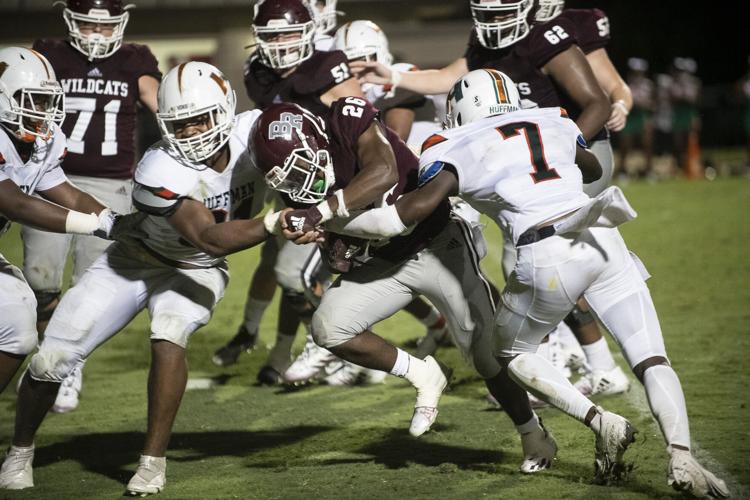 PHOTOS: Ben Russell hosts Huffman in the first game of the season