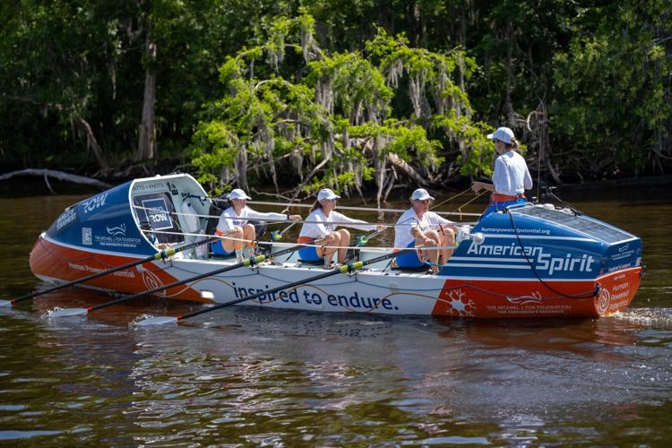 Human Powered Potential’s Team Captain Ashley Ellis (Right, Standing) leads her crew as they train on board the American Spirit boat on the St. Johns River outside Sanford, Florida, on April 18, 2026. The team is preparing to row the 5,000-mile Great Am...