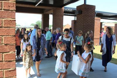 Reeltown families tour new elementary school