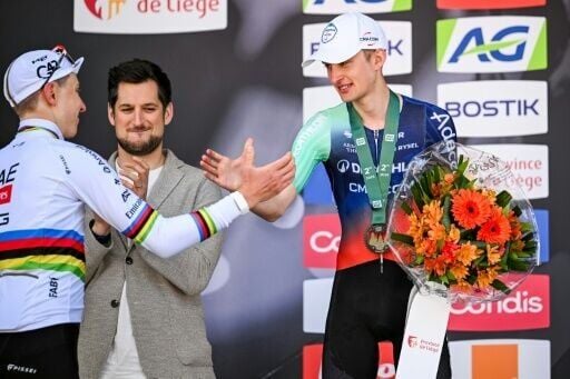 World champion Tadej Pogacar (L) expects teenage French sensation Paul Seixas (R) to one day 'destroy' all the competition