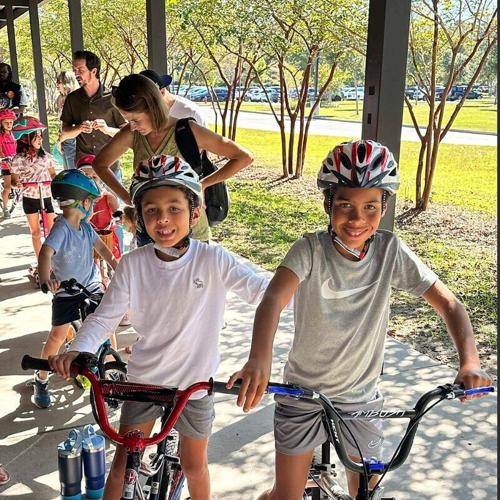 Local kids happy to have received their free helmets during a recent 'Helmets for Kids' event