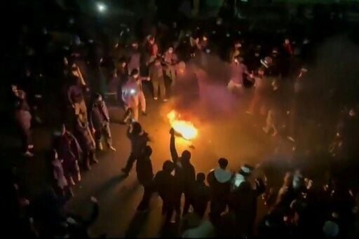 A video grab from UGC images shared online on January 9 showing crowds in Tehran's Pounak Square
