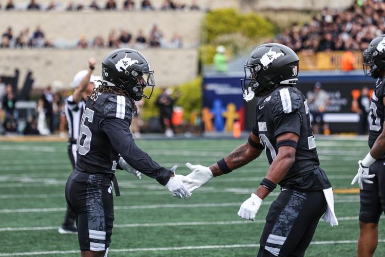 chambers and Jacorey Thomas shake hands