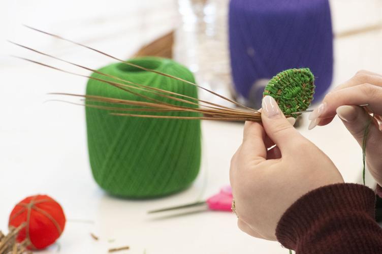 PHOTOS: Learning to weave pine straw baskets