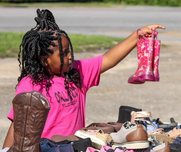 PHOTOS: Alpha Group hosts Back to School Giveaway