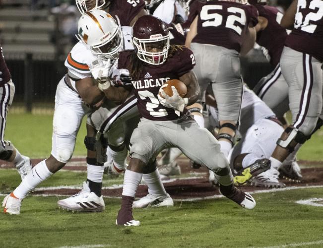 PHOTOS: Ben Russell hosts Huffman in the first game of the season