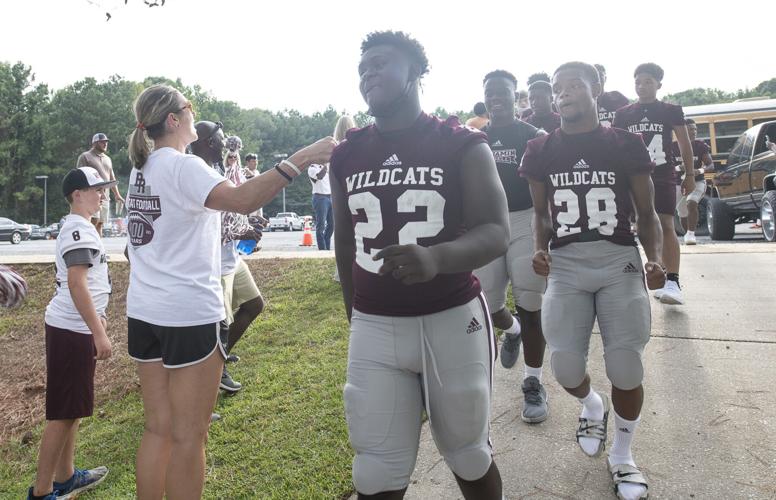 PHOTOS: Ben Russell hosts Huffman in the first game of the season