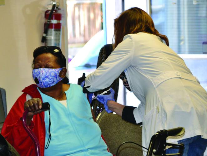 Covington Healthcare’s Sarah Covington offered free vaccines to qualifying individuals