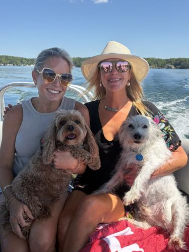 Jen Dye and Ronda Moreland boat dogs.jpeg