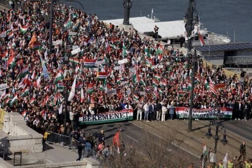 Hungarians from around the country travelled to the capital on the national day to express their backing of Orban