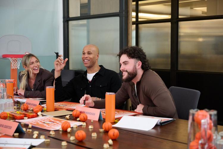 Katie Feeney, Richard Jefferson, and Cullen Honohan participate in bracket discussions during the Reese's Summit for "Every Bracket Busts for a Reese's"
