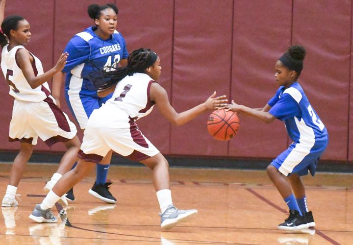 PHOTOS: Alex City Middle School, Central Coosa battle on the hardwood