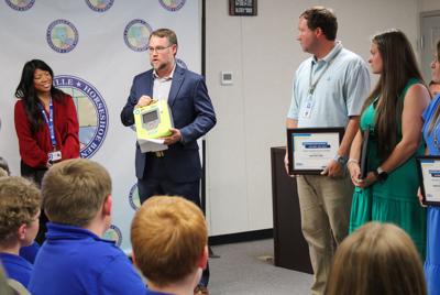 School staff honored for life saving actions
