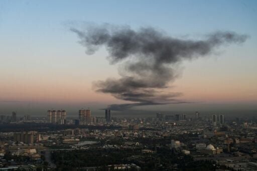 AFP photographer captures smoke rising near Erbil International Airport after an explosion on March 1
