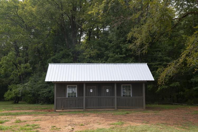 PHOTOS: Talisis Historical Society adds bathrooms to Patterson Cabin