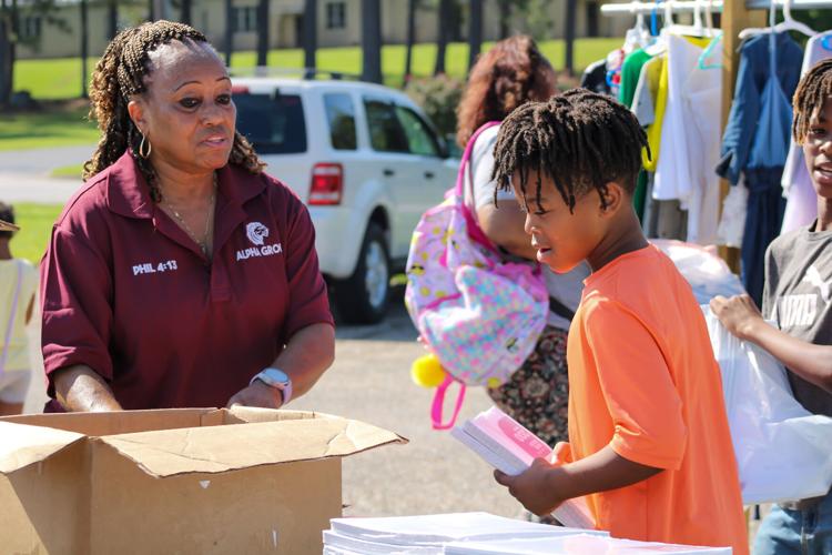 PHOTOS: Alpha Group hosts Back to School Giveaway