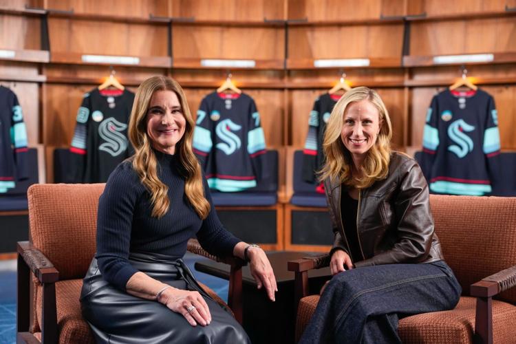 One Roof Sports and Entertainment's majority owner and managing partner, Samantha Holloway and Melinda French Gates pose for a photo.