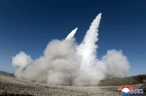 This picture taken on January 27, 2026 and released by North Korea's official Korean Central News Agency (KCNA) on January 28, 2026 shows a test firing of the renewed large-caliber rocket launcher system