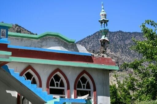 A damaged minaret of a mosque in Barikot village