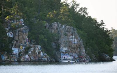 Cliff Williams / TPI First responders search the waters of Lake Martin at Chimney Rock after someone jumped off and didn’t resurface Wednesday afternoon.