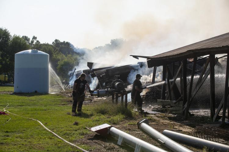 PHOTOS: Hay barn fire at Bar J Farms