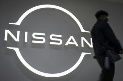 Japanese automaker Nissan forecast a huge annual loss that would amount to twice as much as what analysts had predicted