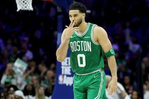 Boston's Jayson Tatum celebrates a three-pointer in the Celtics' victory over the Philadelphia 76ers in game four of their NBA playoff series